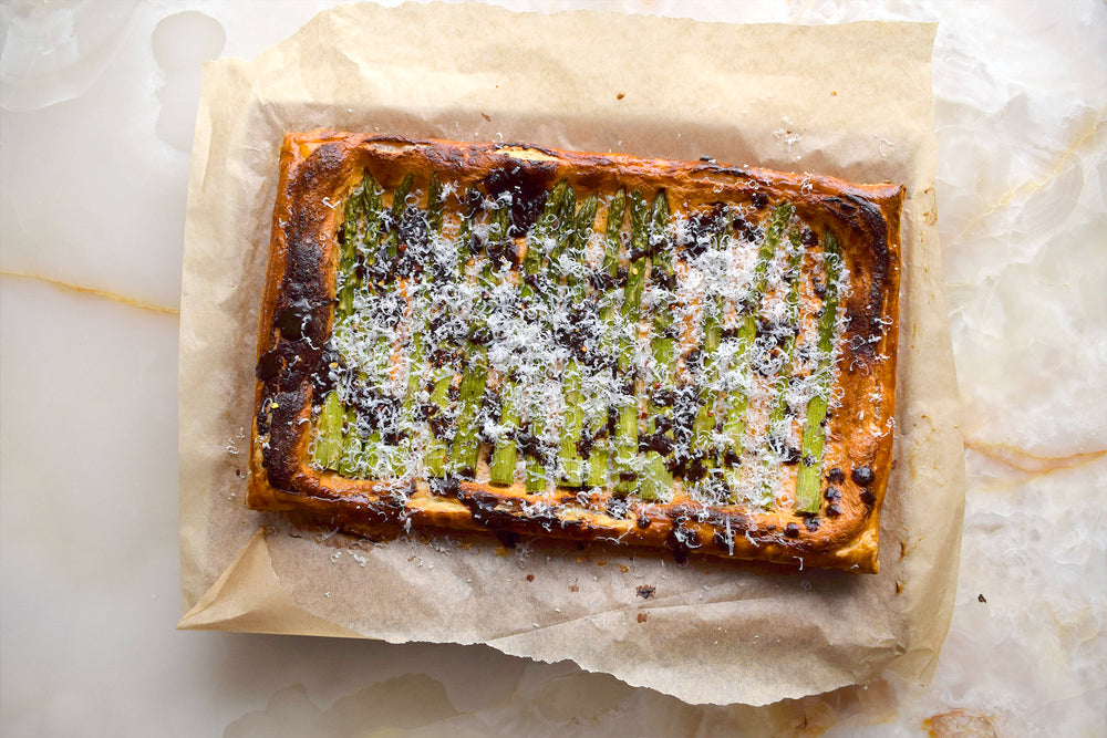 Asparagus and ricotta tart with miso and black garlic