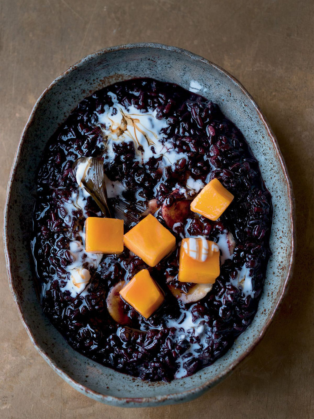 Black rice with mango and coconut cream