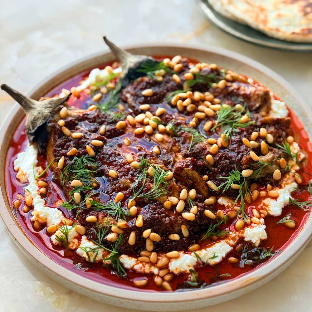 Burnt aubergine with feta and harissa oil