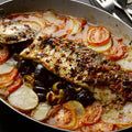 Chermoula-marinated sea bass stuffed with olives and preserved lemon