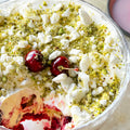 Cherry trifle with pistachio and rosemary crumble