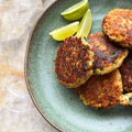 Chorizo, banana and prawn cakes with harissa yoghurt
