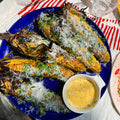 Corn grilled in its husk with creamy pecorino dressing