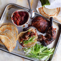 Crispy duck with rye pancakes