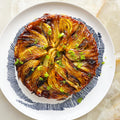 Caramelised fennel and grape tart tatin with saffron and olives