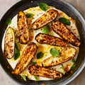 Grilled courgettes with warm yoghurt and saffron butter