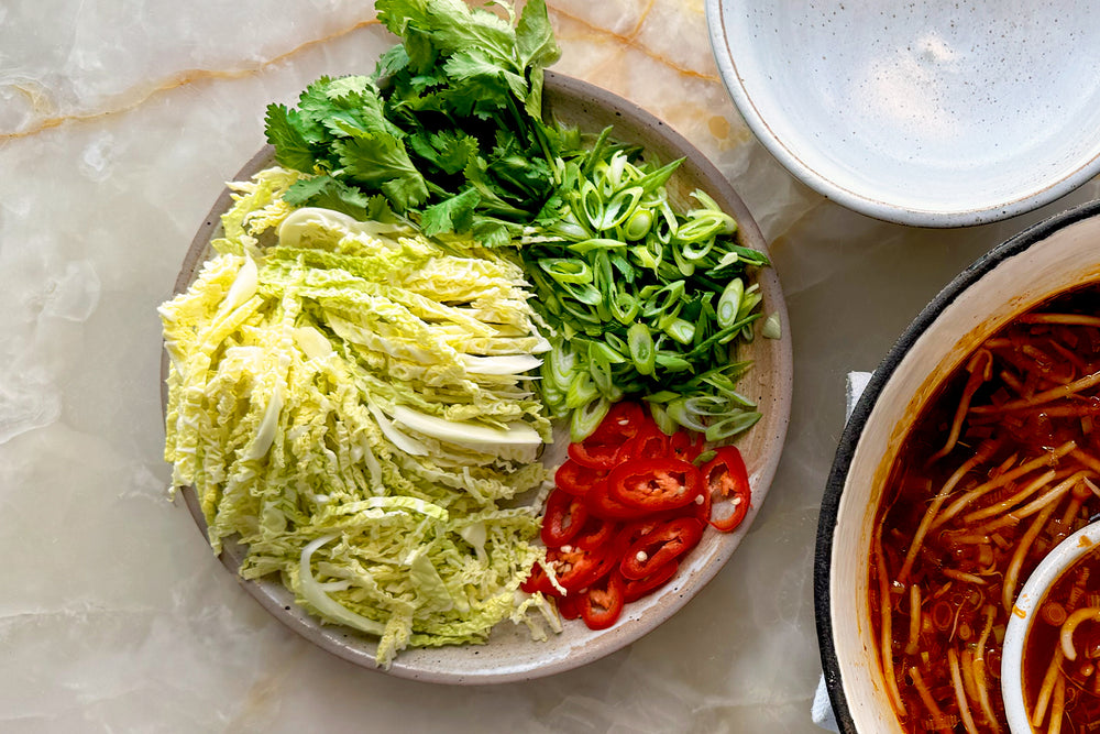 Hot and sour soup with Savoy cabbage and bean sprouts