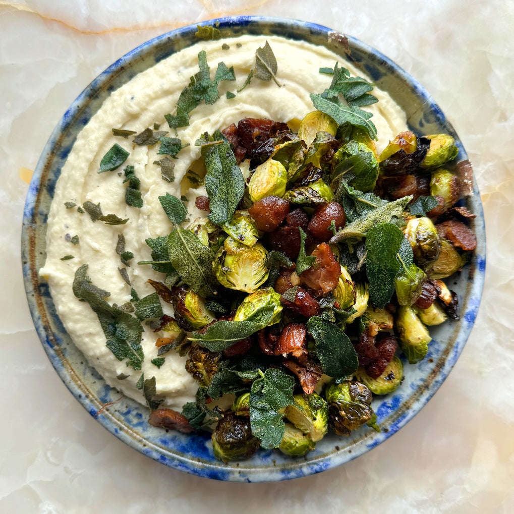 Festive hummus with roasted brussels sprouts and chestnuts 