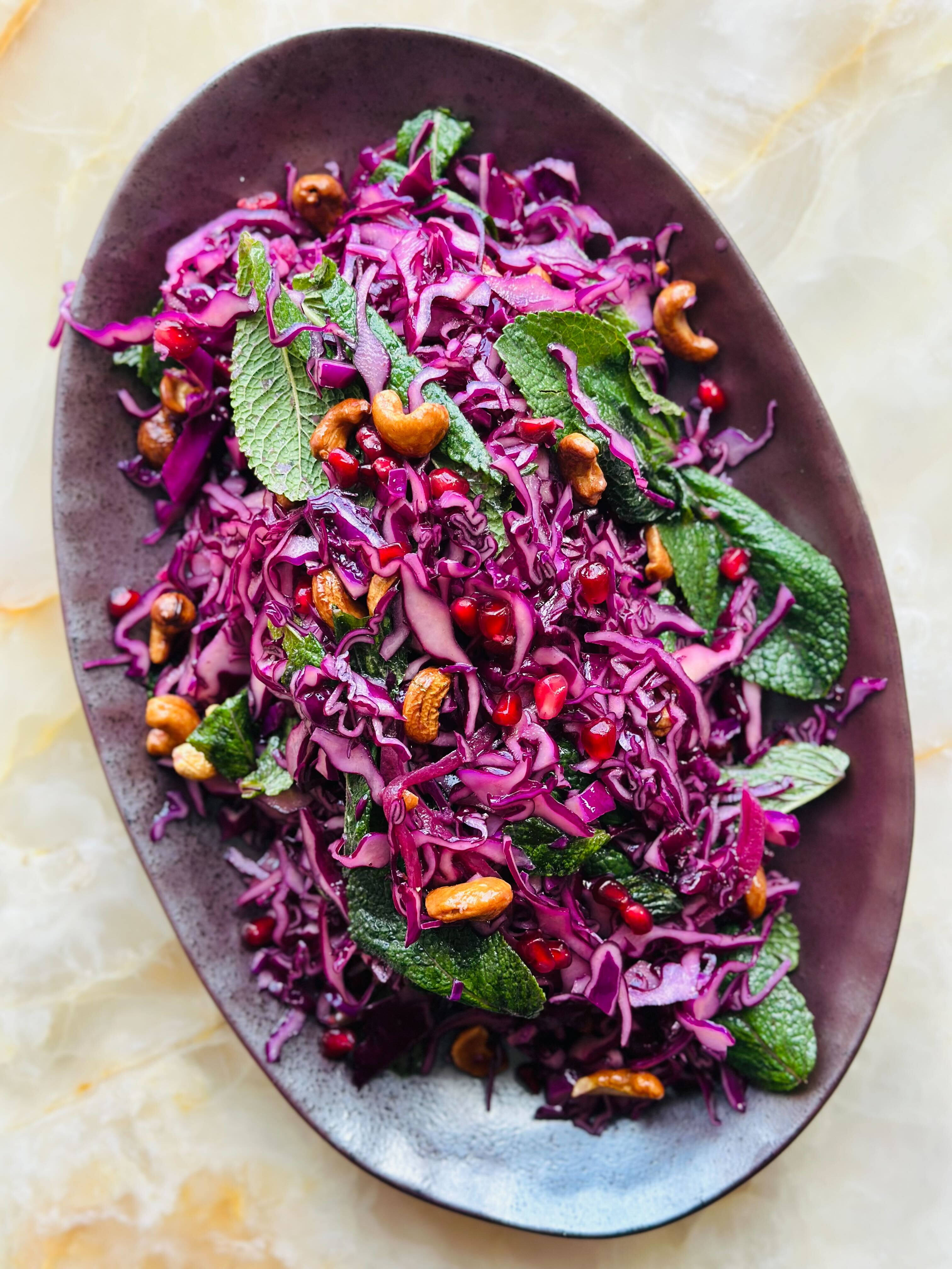Red cabbage slaw with hibiscus pickled onion and mint