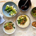 Jook with garlicky choi sum and turmeric oil  