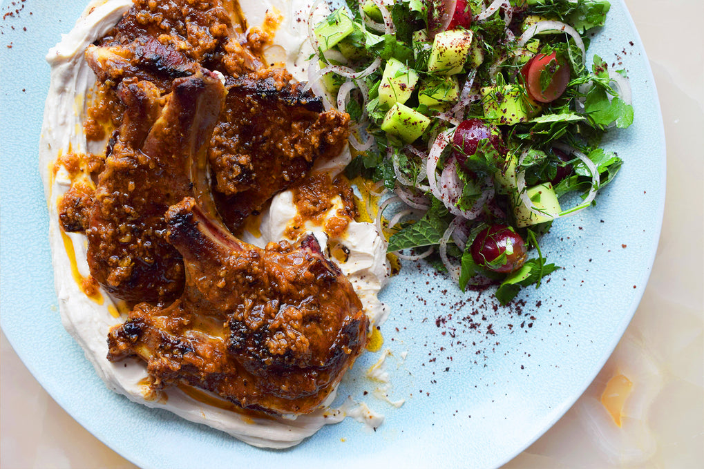 Lamb chops with pilpelchuma oil, tahini yoghurt and herb salad