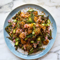 Potato and asparagus salad with black garlic and dukkah
