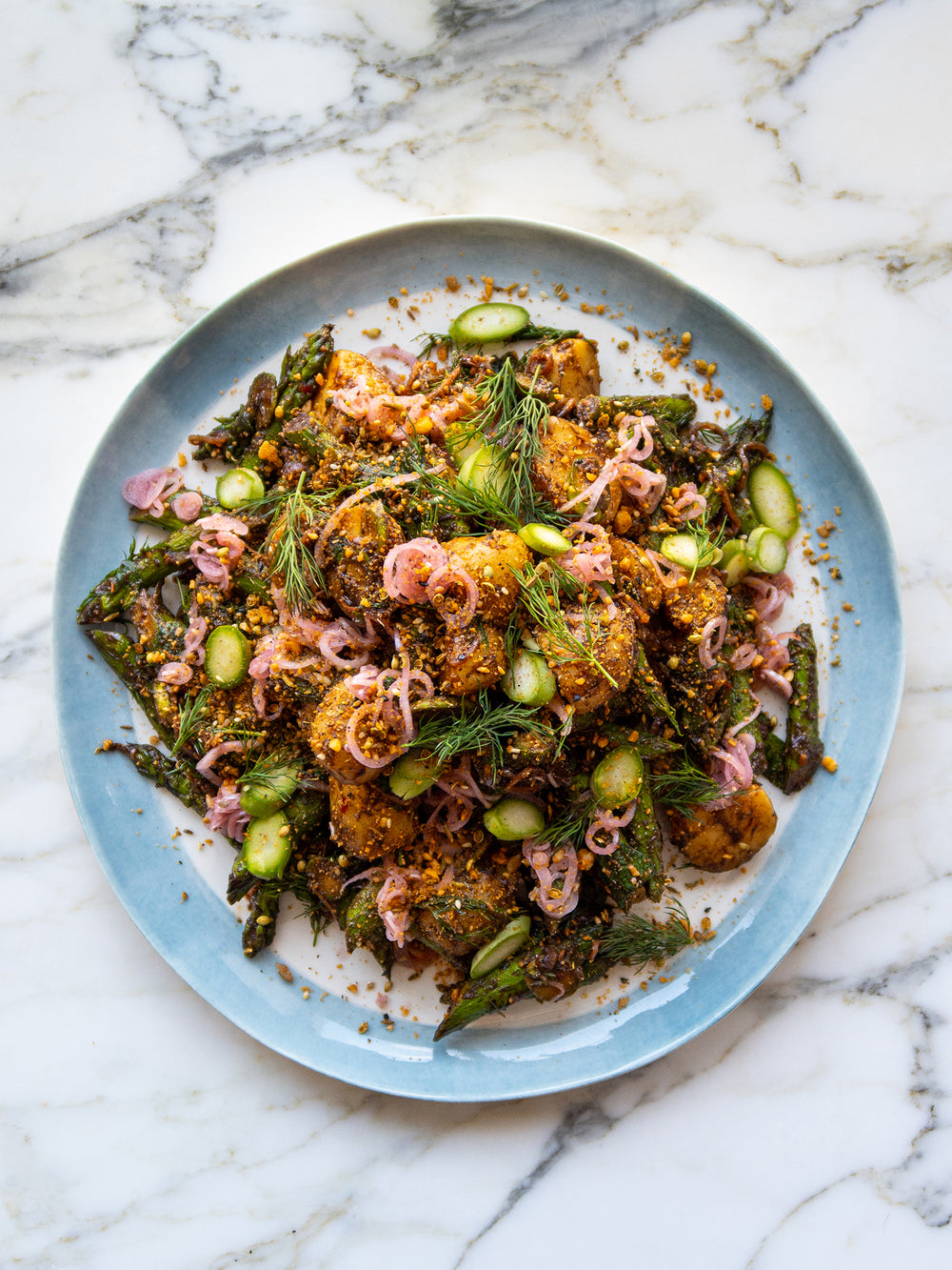 Potato and asparagus salad with black garlic and dukkah