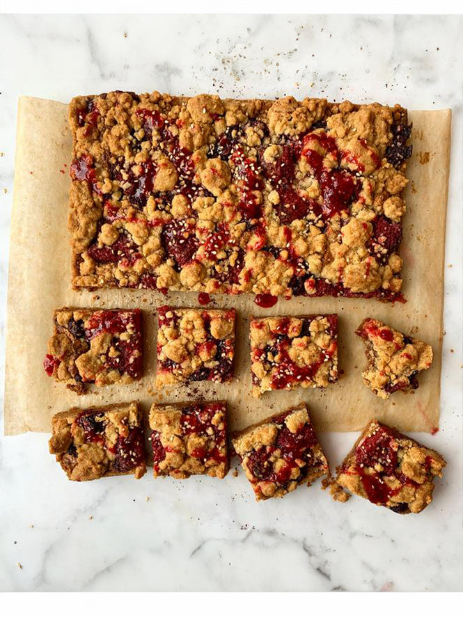 Raspberry halva crumble bars with sumac and rose