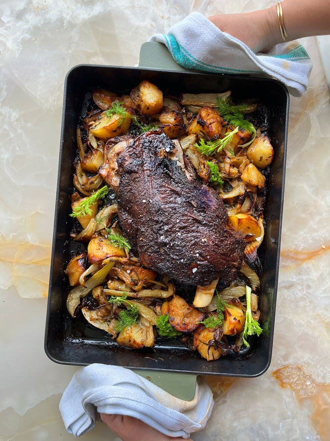 Roast lamb shoulder with potatoes and fennel