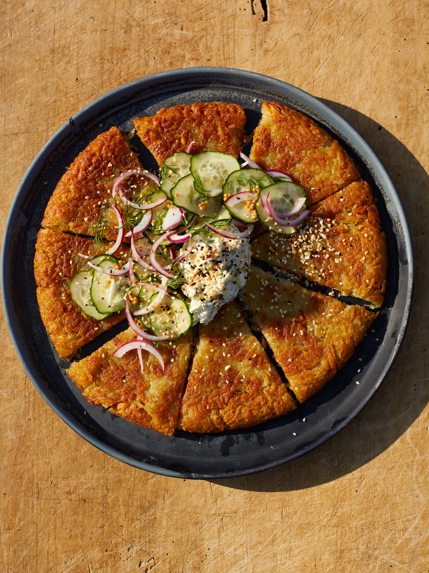 Rösti with cream cheese, dill pickle and everything seasoning