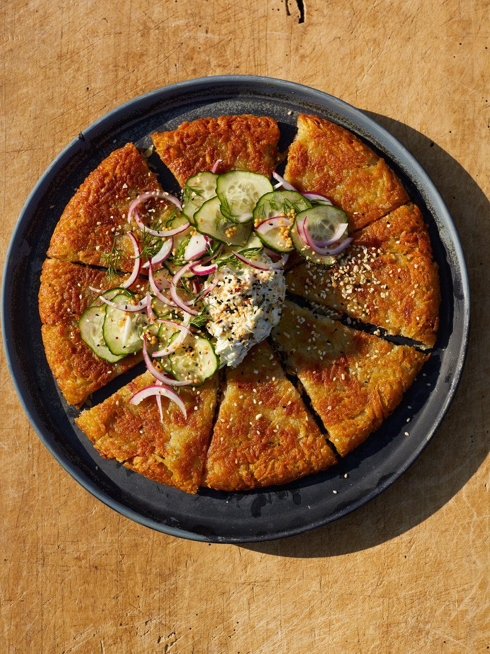 Rösti with cream cheese, dill pickle and everything seasoning