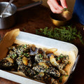 Sesame-crusted feta with black lime honey syrup