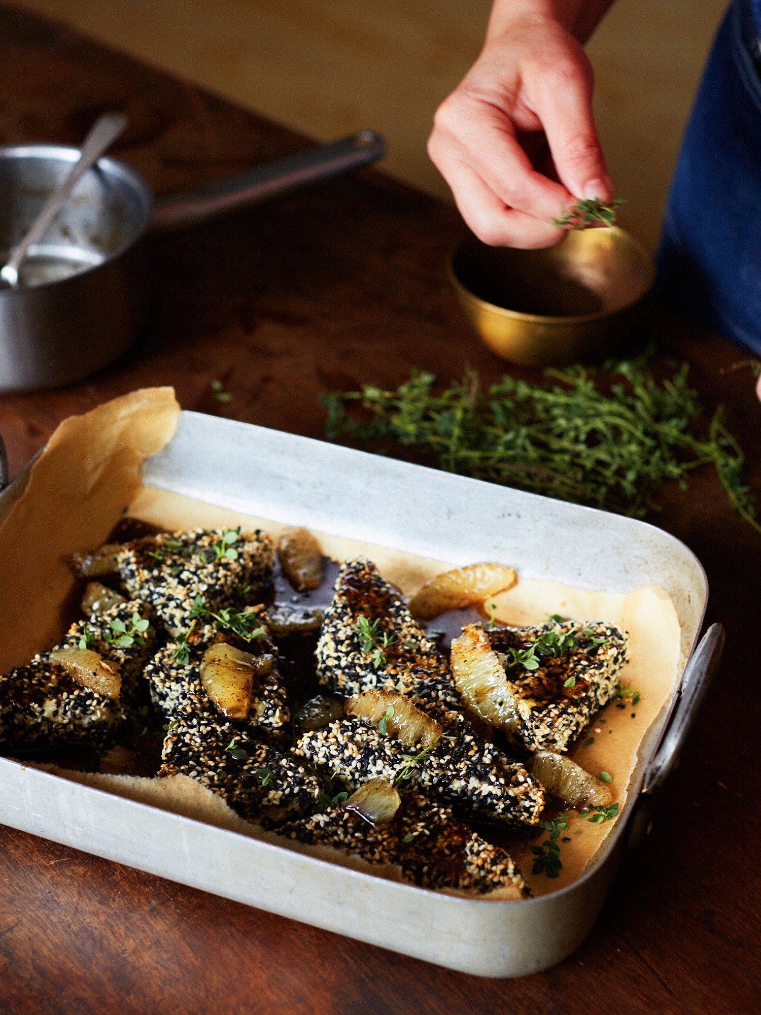 Sesame-crusted feta with black lime honey syrup
