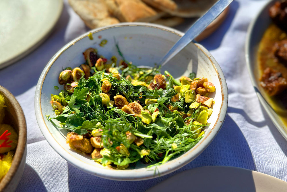 Slow-cooked lamb shoulder with fig and pistachio salsa