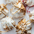 Spiced praline meringues