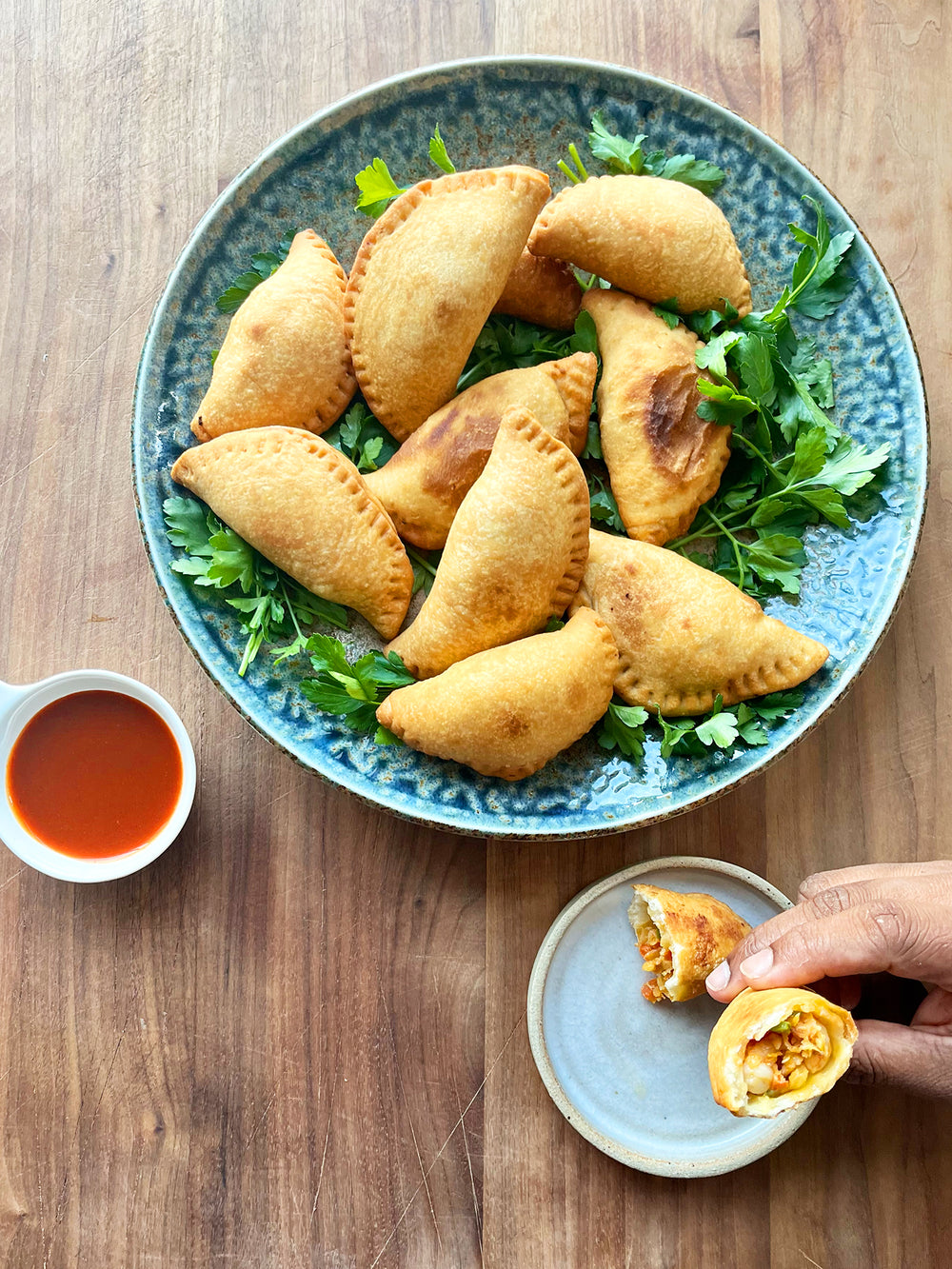 Spicy prawn and celeriac pasties with hot sauce