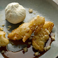 Strained ricotta with banana fritters and maple syrup