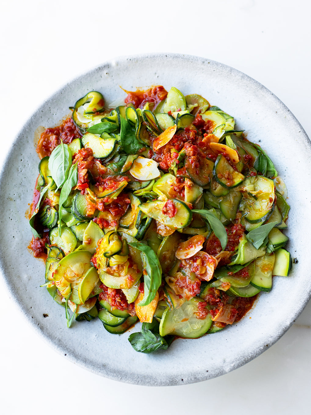 Super-soft courgettes with harissa and lemon