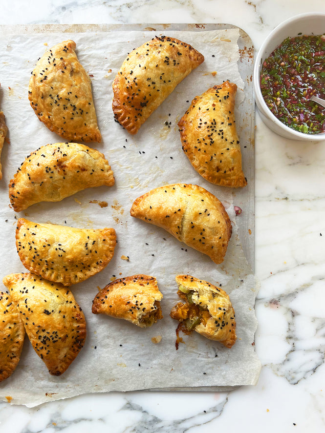 Sweet potato and cheddar empanadas with coriander salsa