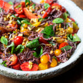 Tomatoes with sumac, onions and pine nuts