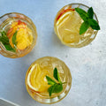 White sangria with kiwi and lemon grass